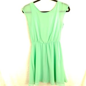 Miami's Sleeveless Beaded Back Mini Dress